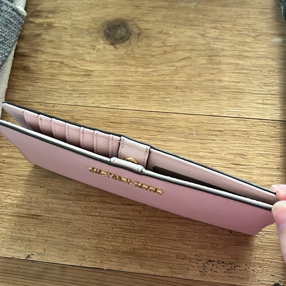 Michael Kors wallet. In great used condition. Lots of space and super cute. - Picture 2 of 4